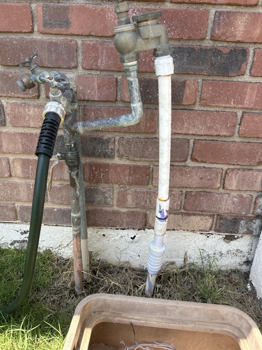 Before: corroded riser and leaking mainline at the backflow preventer